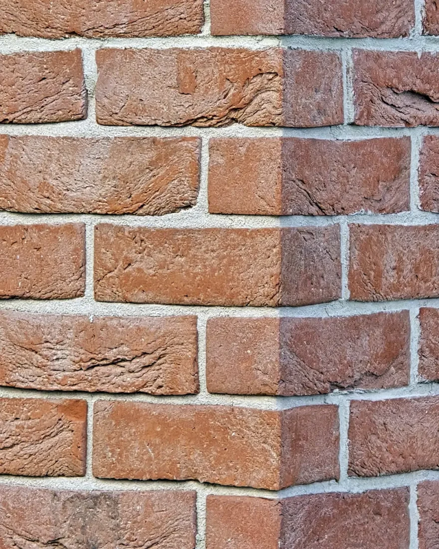 hjørne av et bygg viser tegl